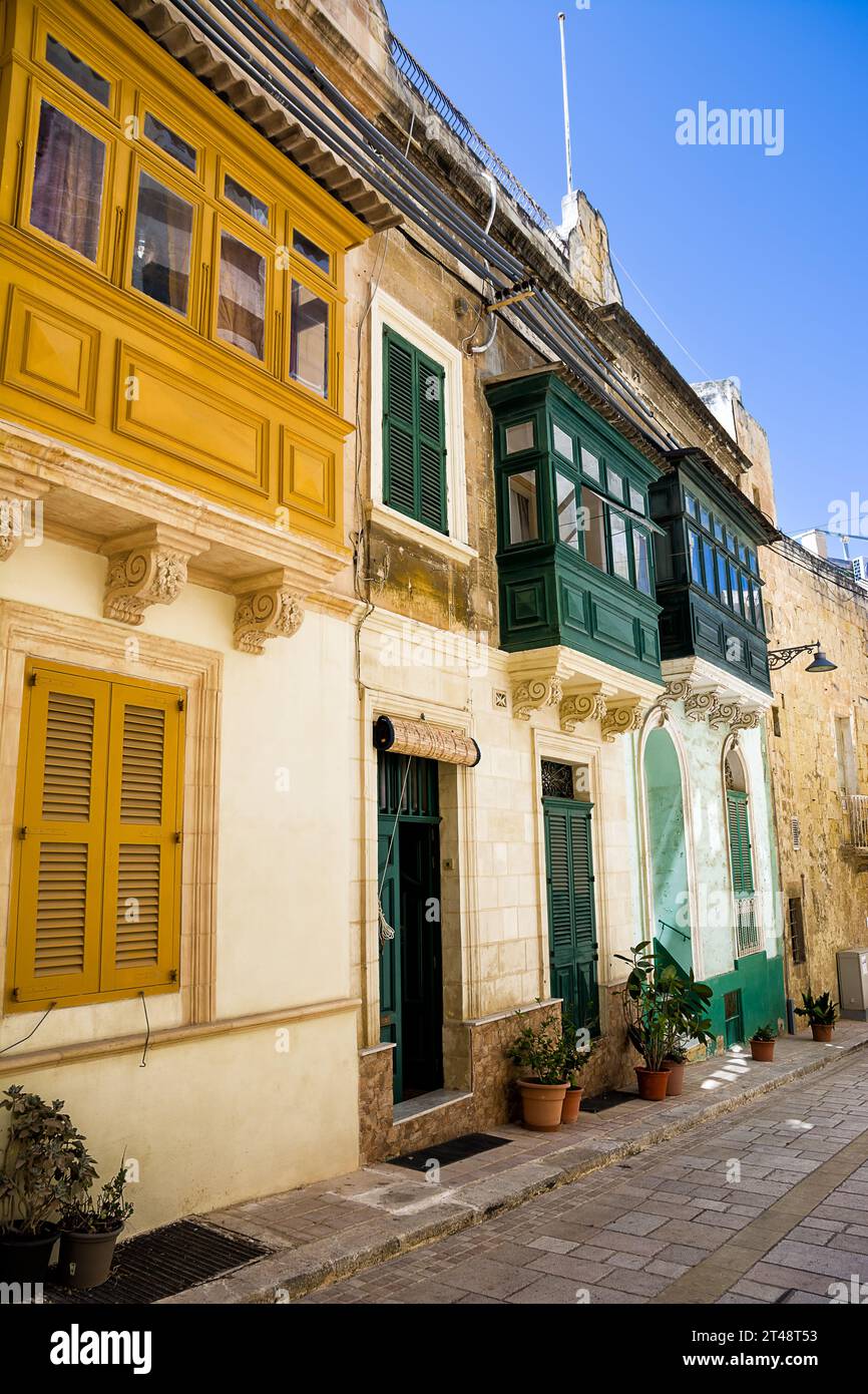 Closed and typical Maltese balconies with the name gallarija Stock Photo