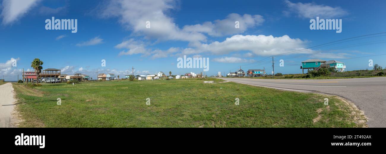 new beach houses at Port Bolivar on wooden stilts to protect against flooding, Texas, USA Stock Photo