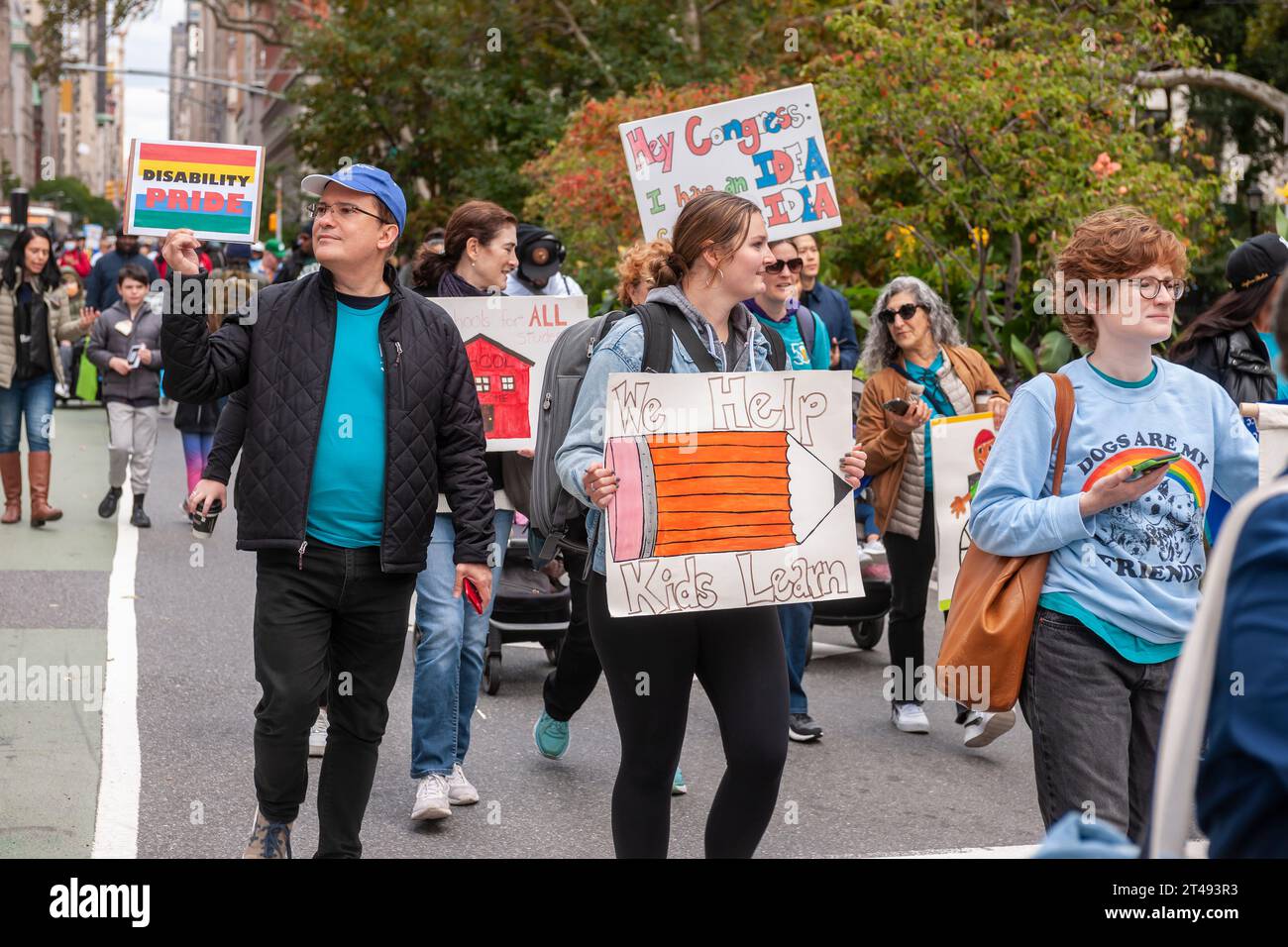 People with disabilities and their supporters march from Madison Square Park in New York for the Disability Pride Parade on Sunday, October 22, 2023 celebrating the Americans With Disabilities Act (ADA).  The ADA ensured accessibility to the disabled and removed barriers to employment, transportation, public accommodations, public services and telecommunications. (© Richard B. Levine) Stock Photo