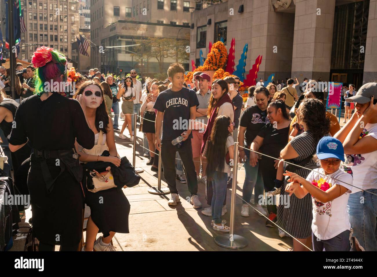 Visitors to Rockefeller Center in New York on Saturday, October 28