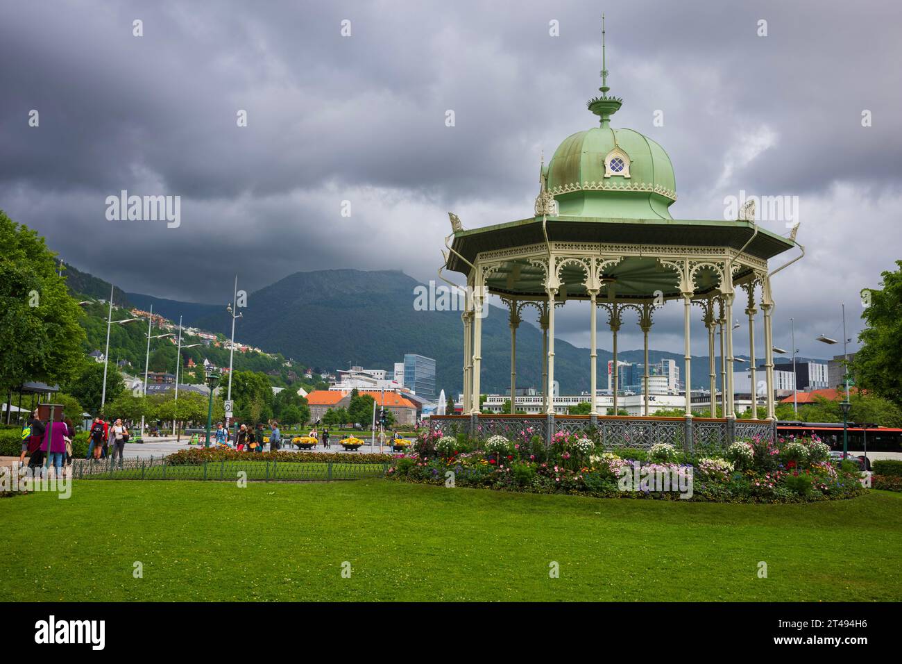 Bergen, Norway, June 22, 2023: Pedestrains walk the city streets of Julemarked Byparken in the center of Bergen during an afternoon. The area is famou Stock Photo