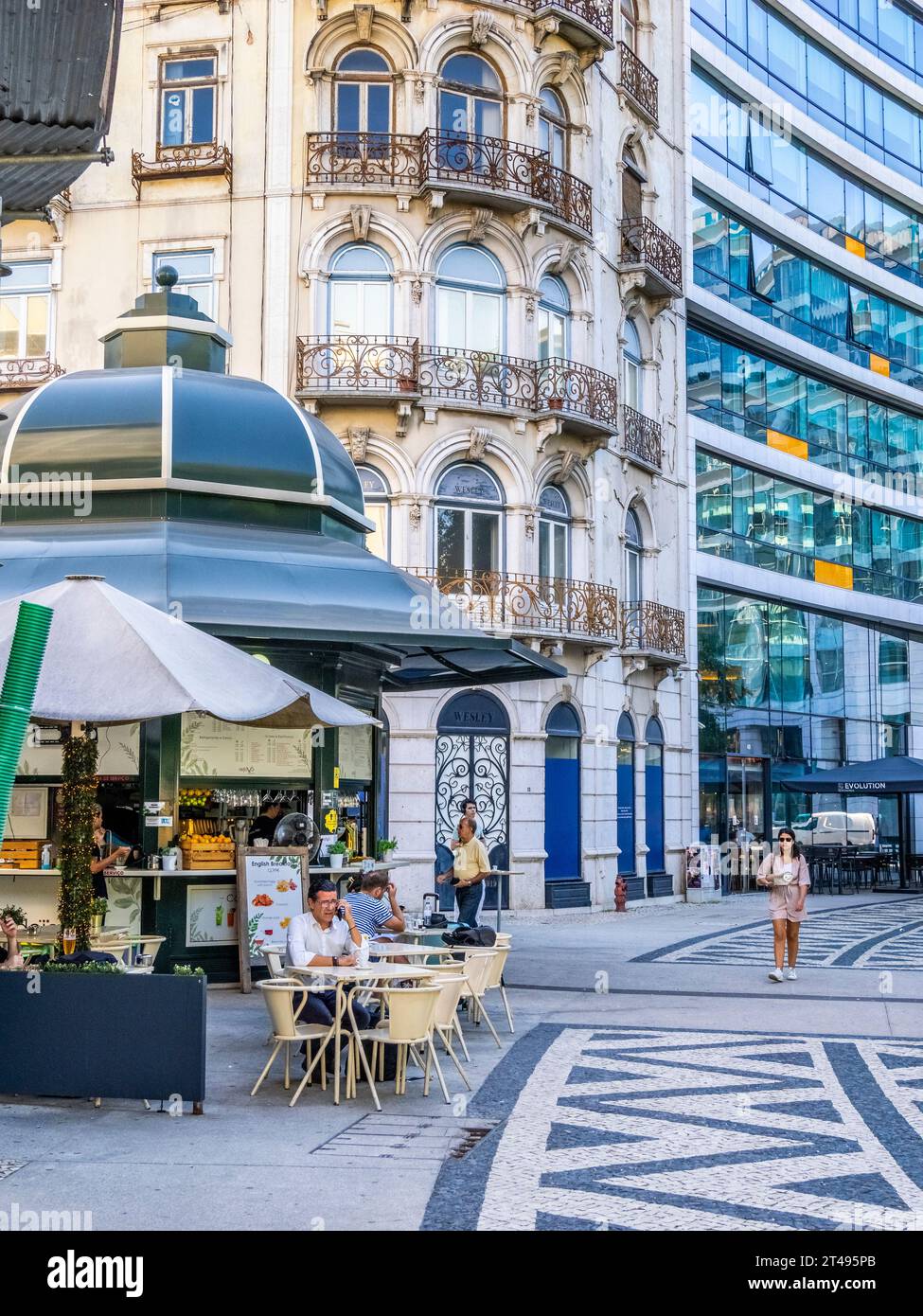 Outdoor cafe on Praça do Duque de Saldanha or Duke of Saldanha Square in Lisbon Portugal Stock Photo