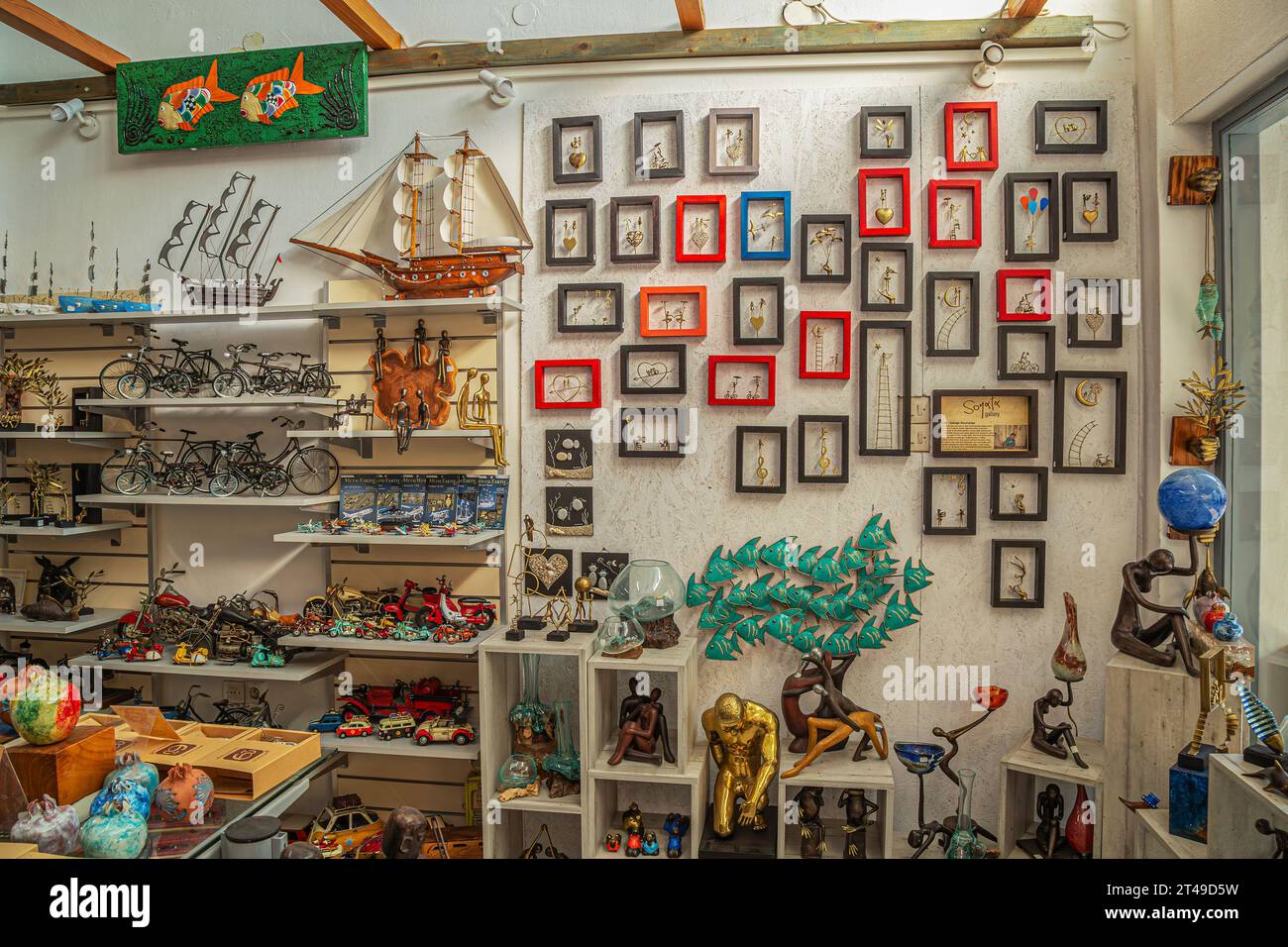 SKIATHOS TOWN, SPORADES ISLANDS, GREECE - AUGUST 20, 2023: Interior of a nice and funny souvenir shop located on the touristical and commercial street Stock Photo