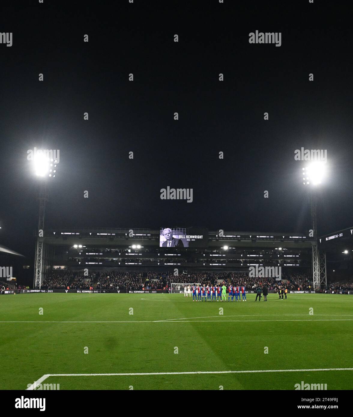 LONDON, ENGLAND - OCTOBER 27: Players pause to remember Bill Kenwright before the Premier League match between Crystal Palace and Tottenham Hotspur at Stock Photo