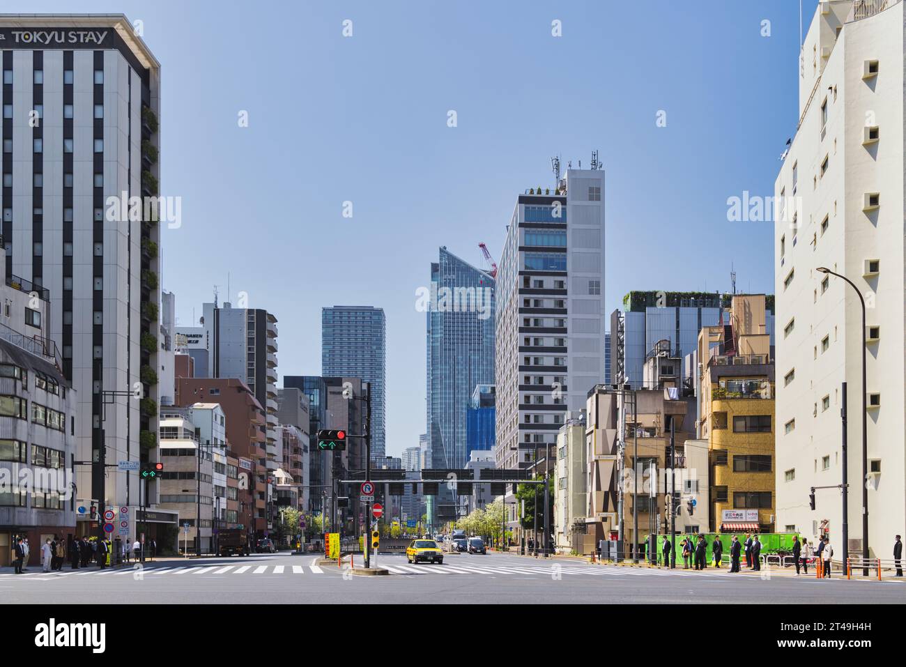 Tokyo, Japan - April 10, 2023: City view with a street in the Minato district. Minato is a special ward in the Tokyo Metropolis merged 1947 of Akasaka Stock Photo