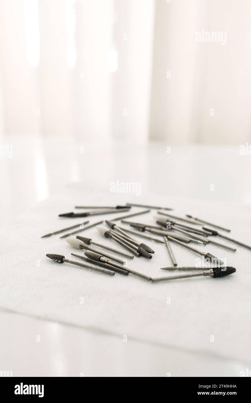 Podologist's medical instruments. Mill for processing the nail plate. Stock Photo