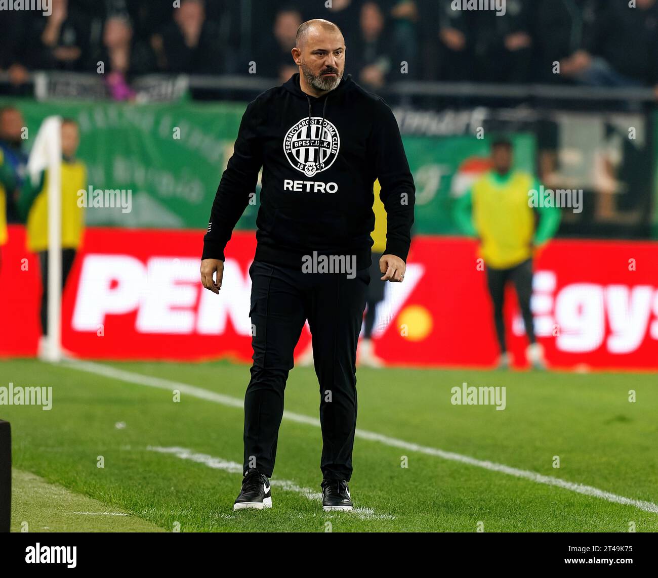 BUDAPEST, HUNGARY - MARCH 6: Claudiu Bumba of Kisvarda Master Good  challenges Henry Wingo of Ferencvarosi TC during the Hungarian OTP Bank  Liga match between Ferencvarosi TC and Kisvarda Master Good at