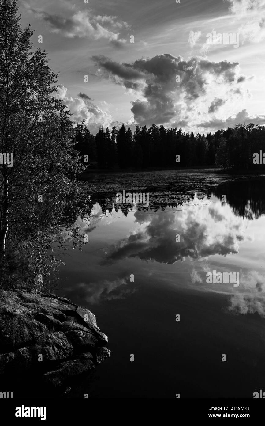 QUIET LAKE, JORMUA, MIDNIGHT SUN: A quiet lake under midnight sun in summer in the Kajaani Region of Central Finland. Photo: Rob Watkins Stock Photo