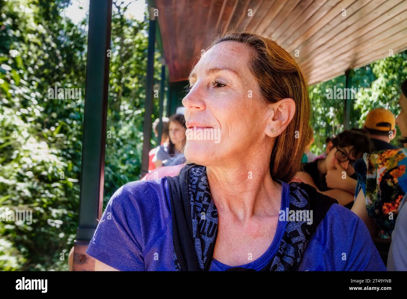 Iguazu National Park, Argentina - July 25, 2022: Tourist rides the park train heading to the Devil's Throat Stock Photo