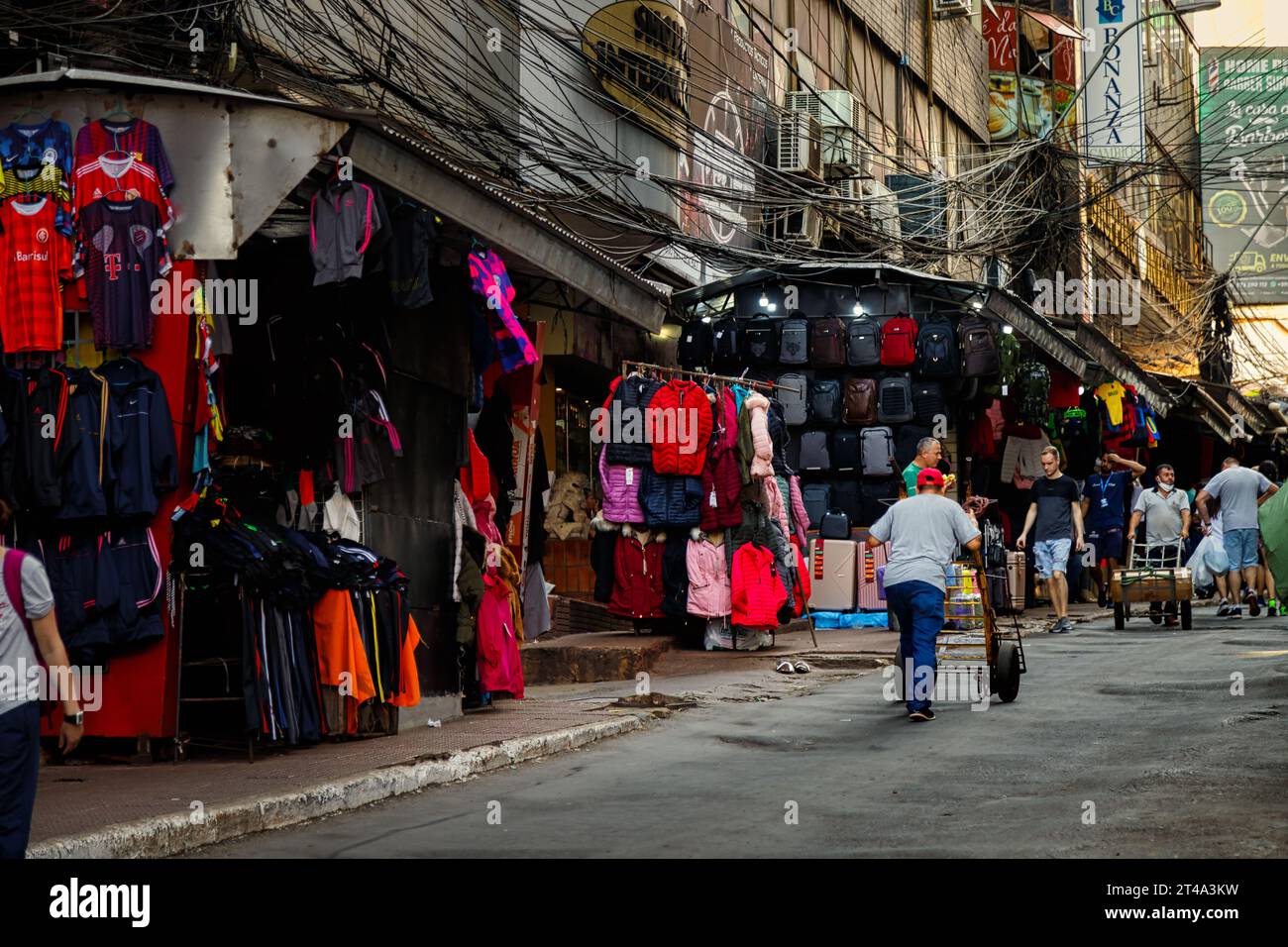 Ciudad del Este, Paraguay - July 27, 2022: "Changadores" (porters) push