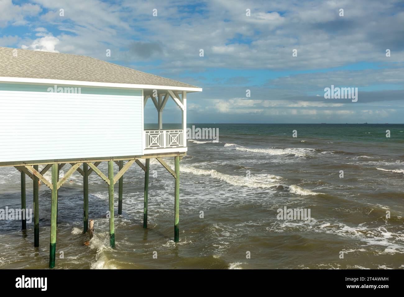typical house on stilts to prevent damage by flooding in stormy weather  as nearly every wooden house at the coast in Texas is constructed this way, G Stock Photo
