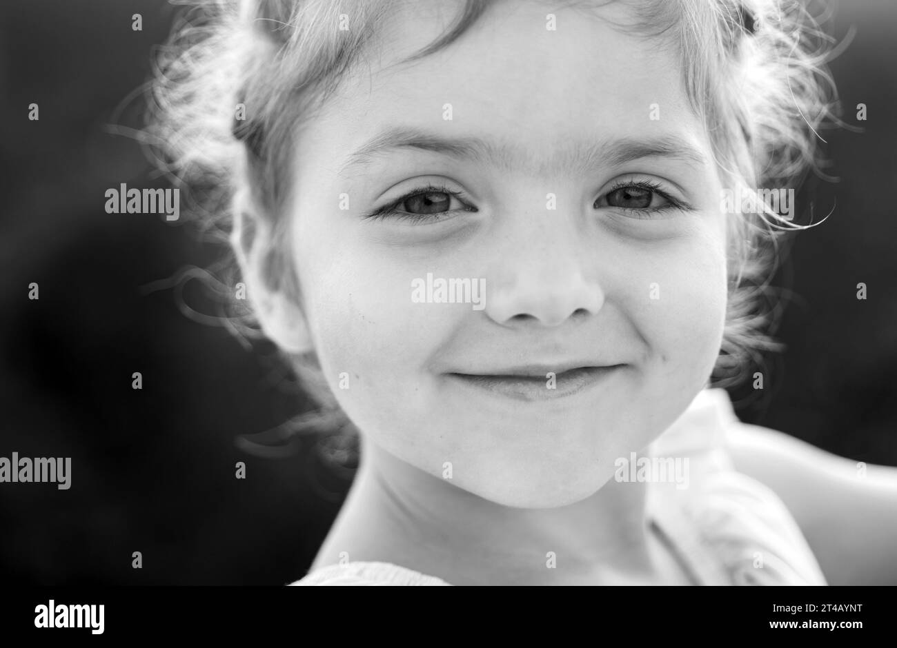 Spring little girl. Sunny kid portrait. Smiling child, positive ...