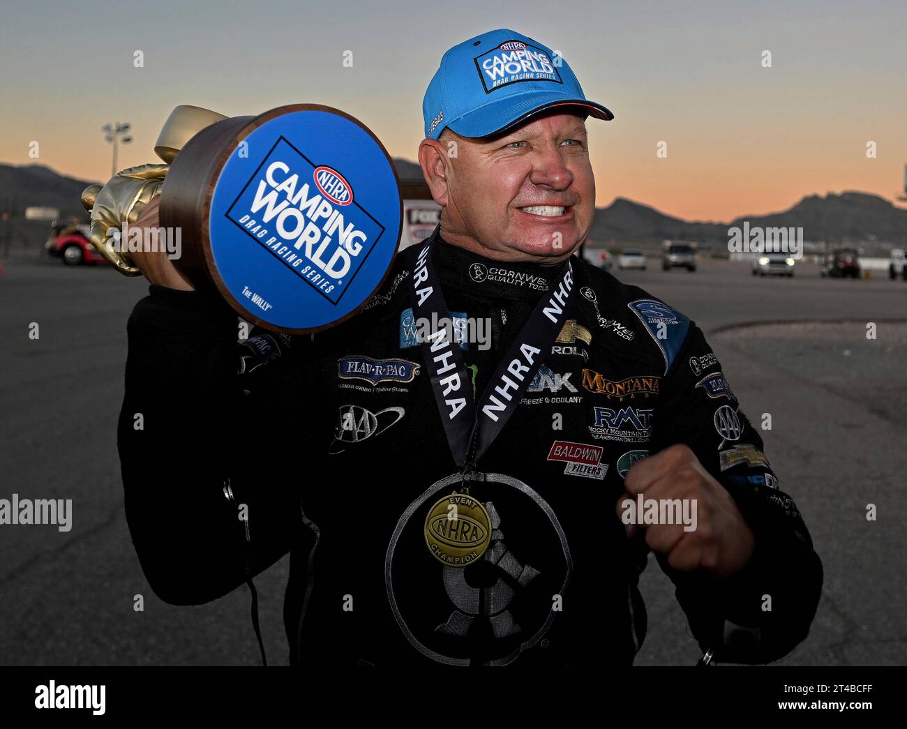 LAS VEGAS, NV - OCTOBER 29: Funny Car driver Robert Hight celebrates