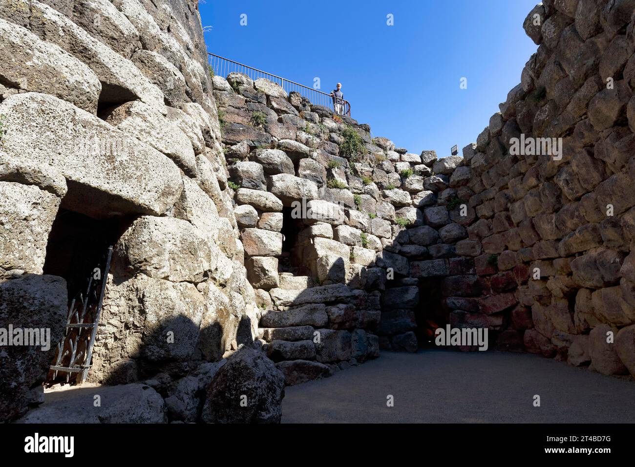 Nuraghe Santu Antine, courtyard at the tower, Bonnanaro culture, megalithic ruin, tourist at the fortress, archaeological site near Torralba Stock Photo