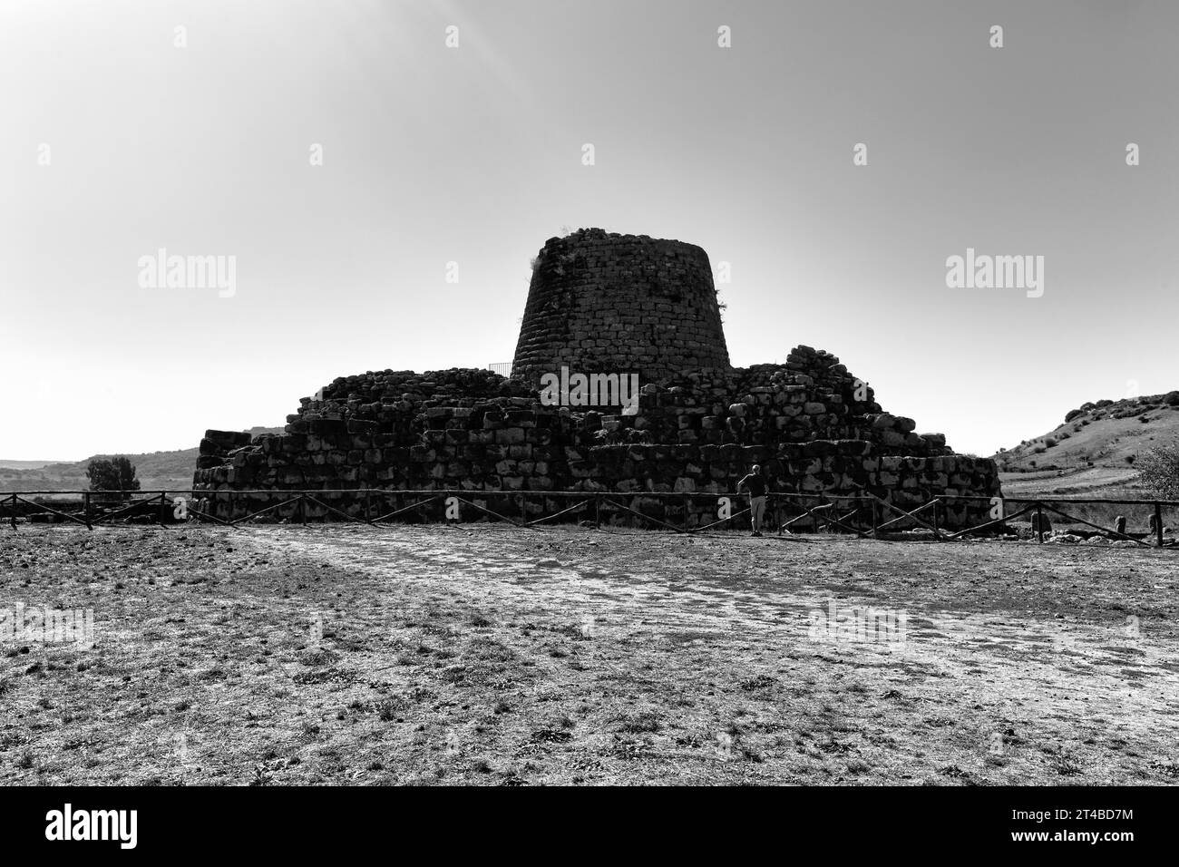 Nuraghe Santu Antine, tower of the Bonnanaro culture, megalithic ruin, fortress, archaeological site near Torralba, monochrome, backlight, Sassari Stock Photo