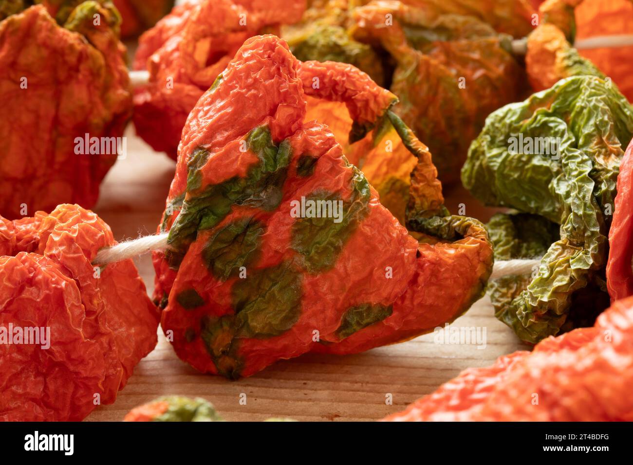 Chain of dried peppers, Biber Kurusu, close up as ingredient Stock Photo