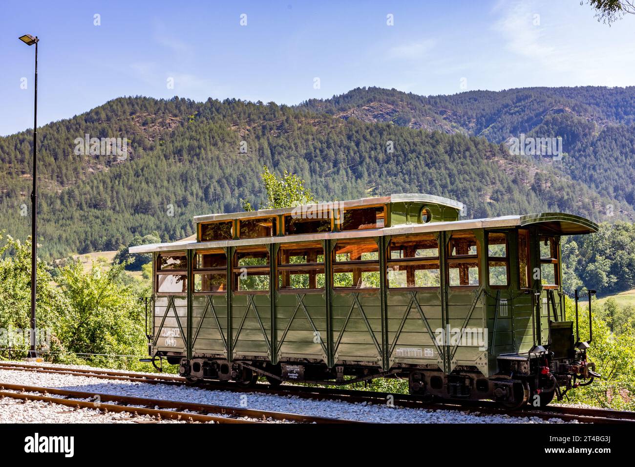 Old wooden planks covered passenger train second class wagon in the countryside, Serbia, Europe Stock Photo