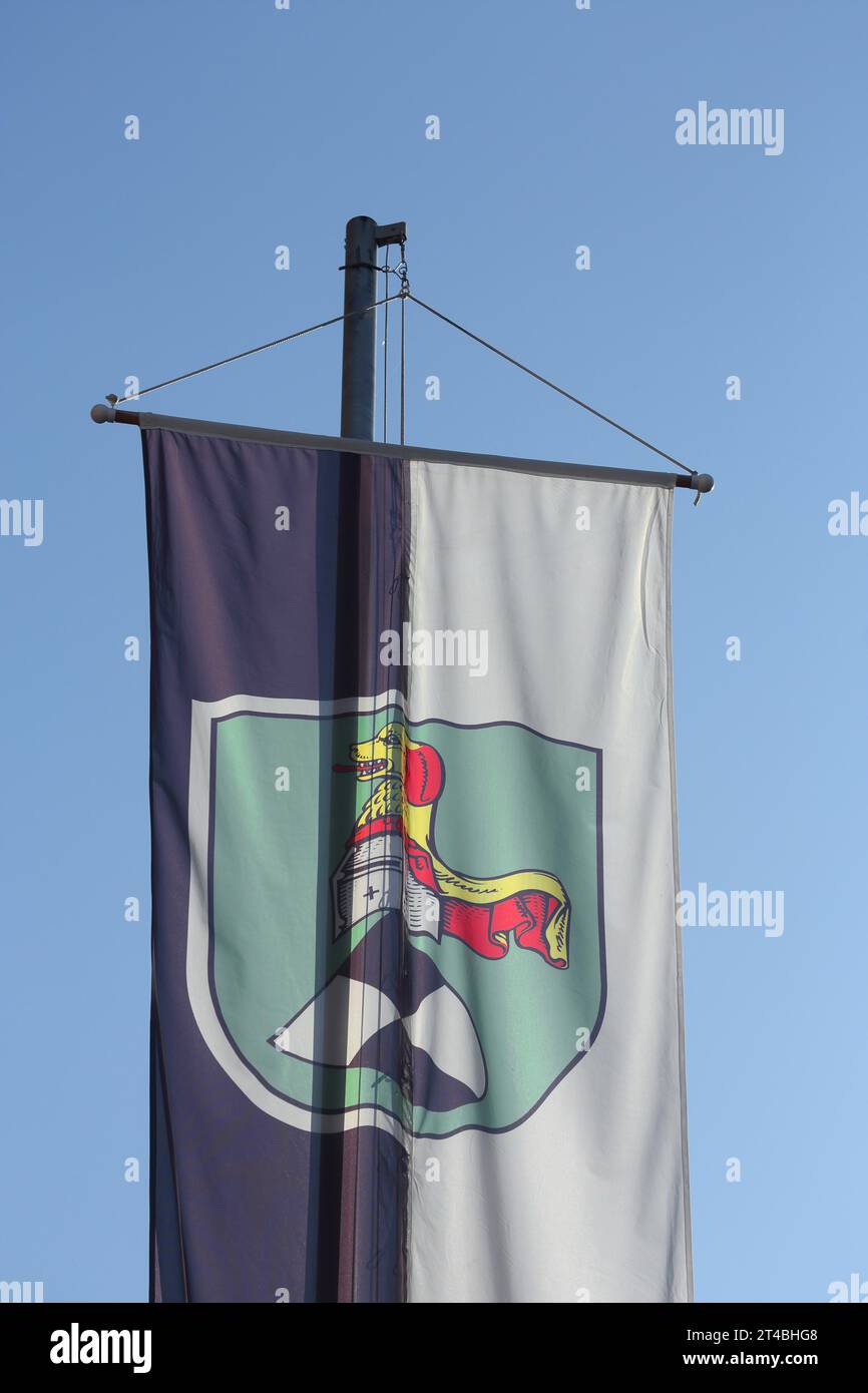City flag at the city hall, city coat of arms, cut-out, Neustadt an der Aisch, Middle Franconia, Franconia, Bavaria, Germany Stock Photo