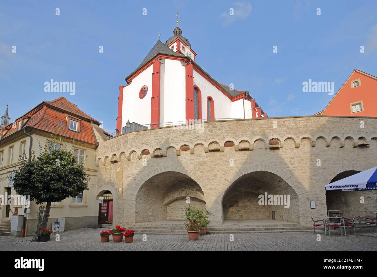 Stone wall with archways and St. Augustine's Church, city wall, church ...