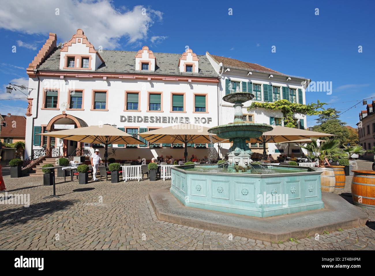 Restaurant Deidesheimer Hof, fountain, building, street pub, people, Deidesheim, Rhineland-Palatinate, Germany Stock Photo