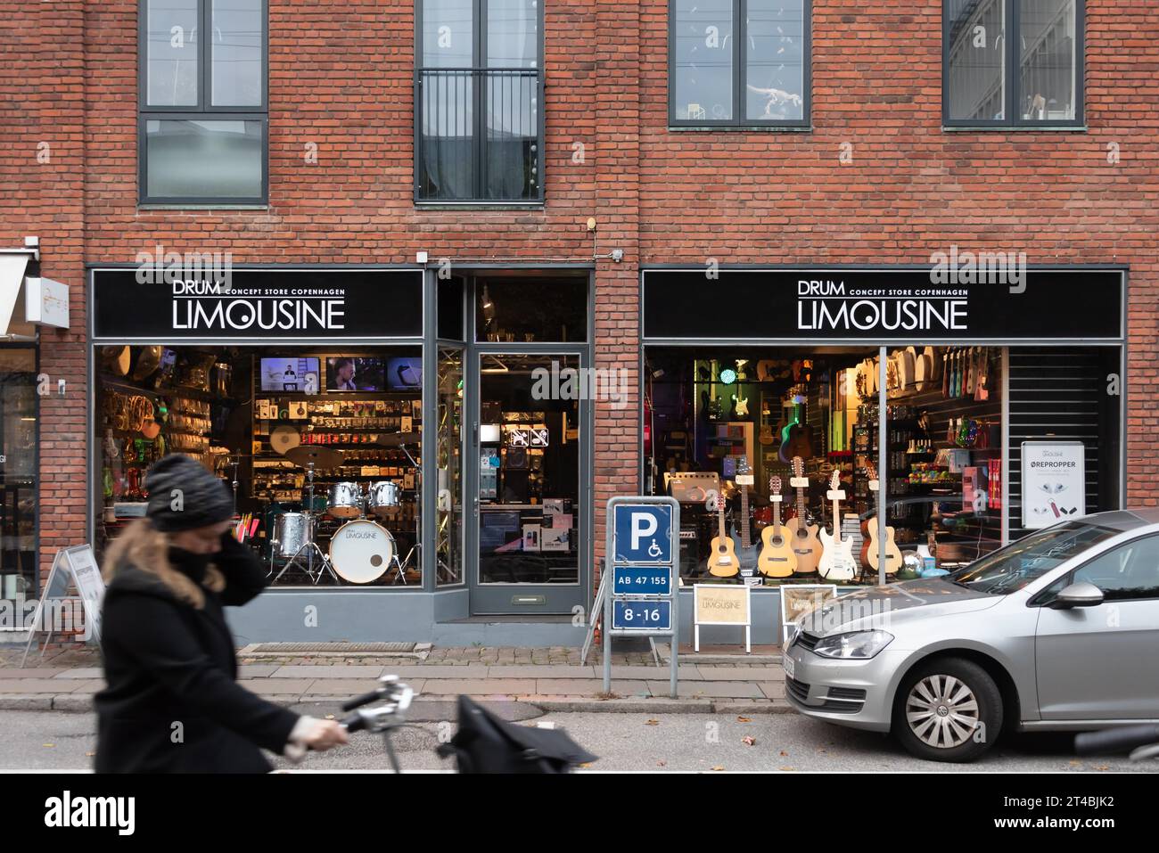 Shop for musical instruments, guitars and drums in the shop window, Copenhagen, Denmark Stock Photo