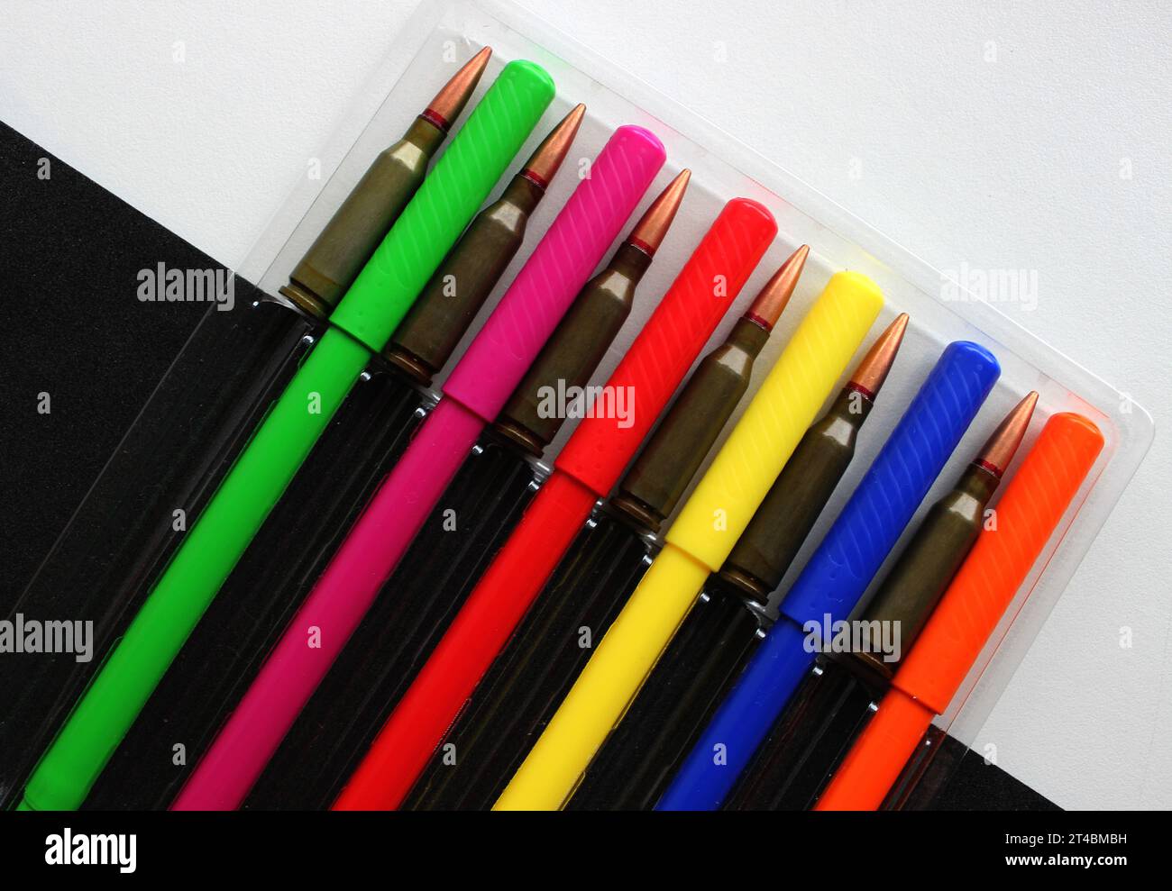 Closed felt tip pens and loaded cartridges are laid out in a case on a ...