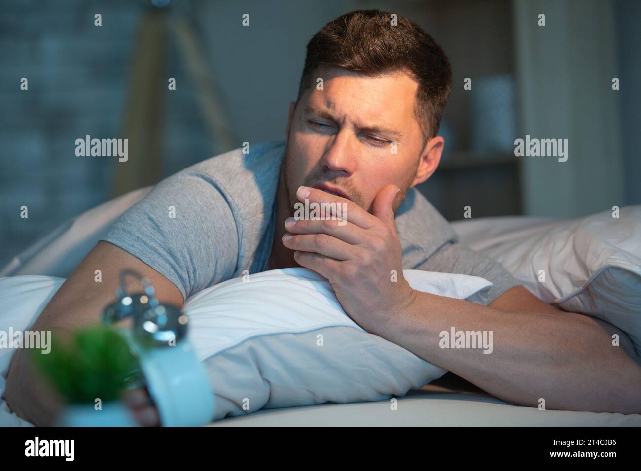 Boy lying bed thinking hires stock photography and images Alamy