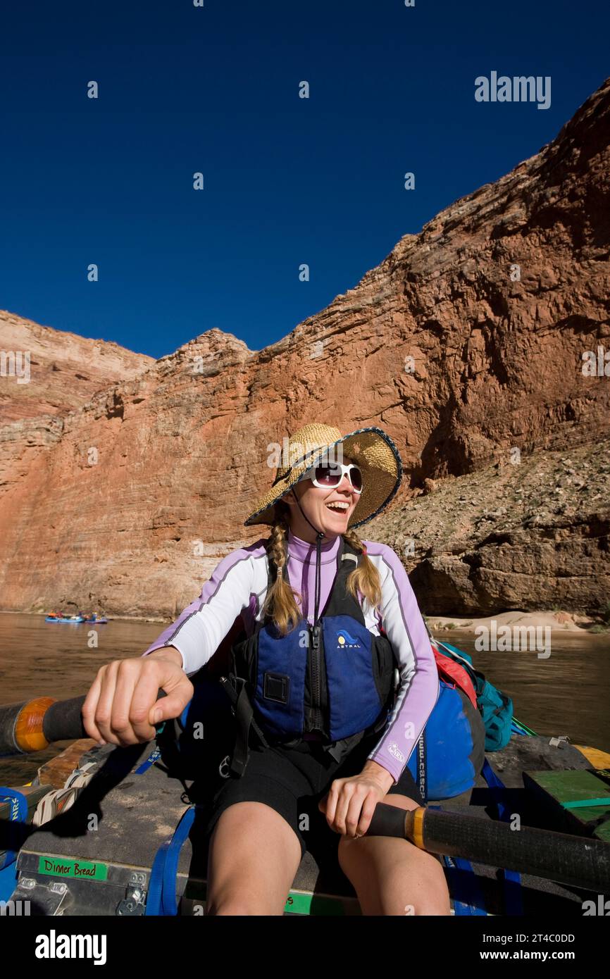 A woman rowing a raft in the Grand Canyon, Arizona Stock Photo - Alamy