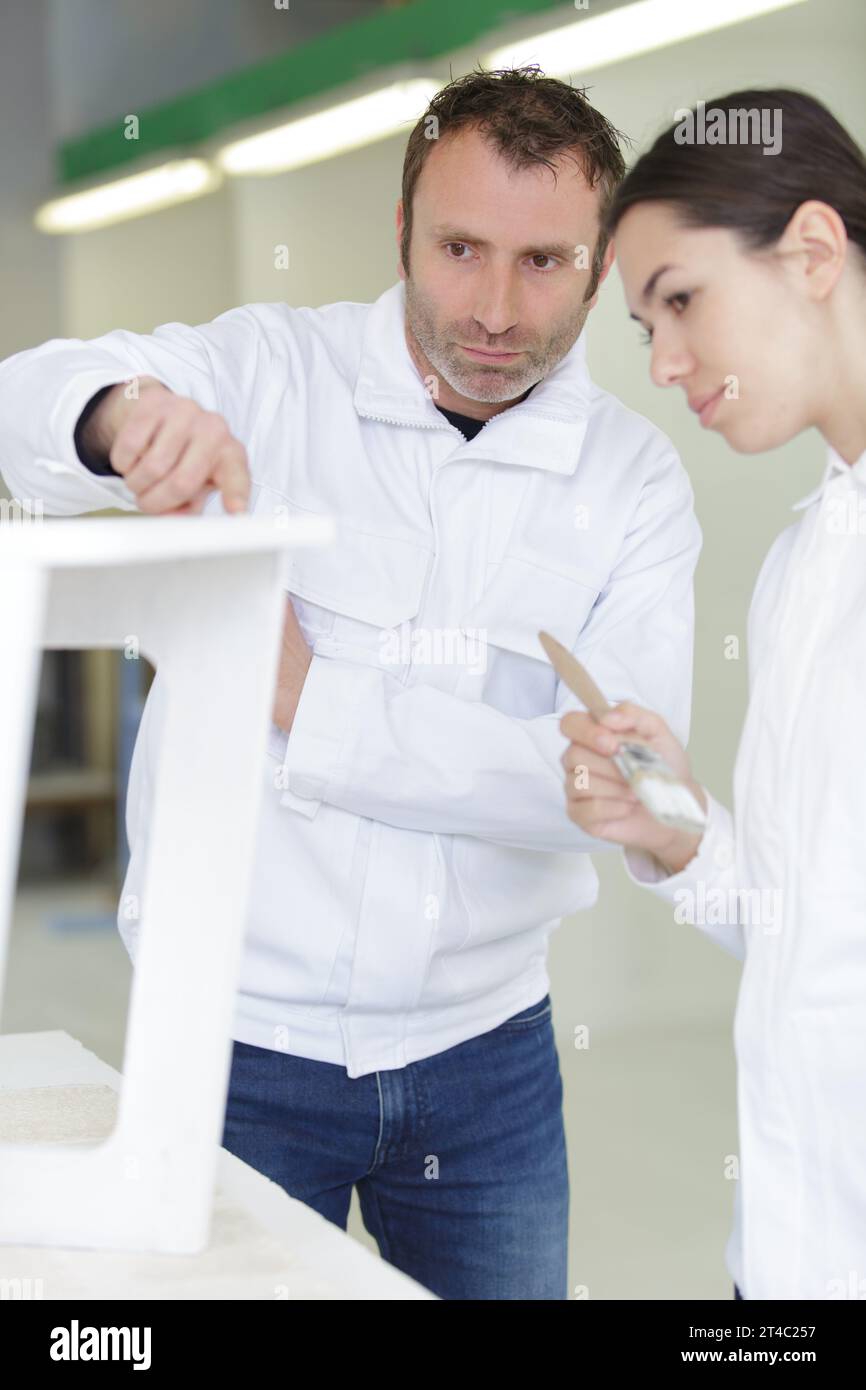 man and woman checking a furniture Stock Photo