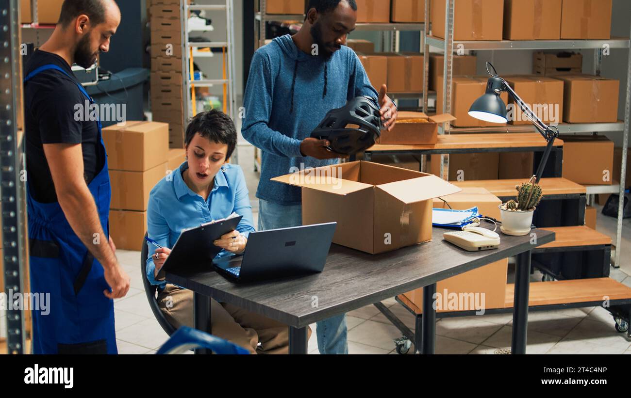 Team startup owners packing merchandise hi-res stock photography and ...