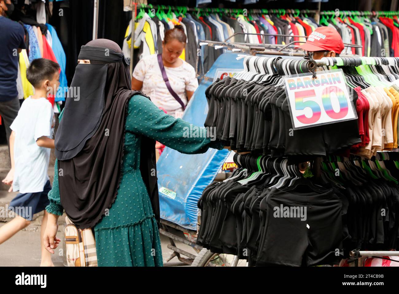 Muslim Woman Selling Clothing In Parañaque District - Metro Manila ...