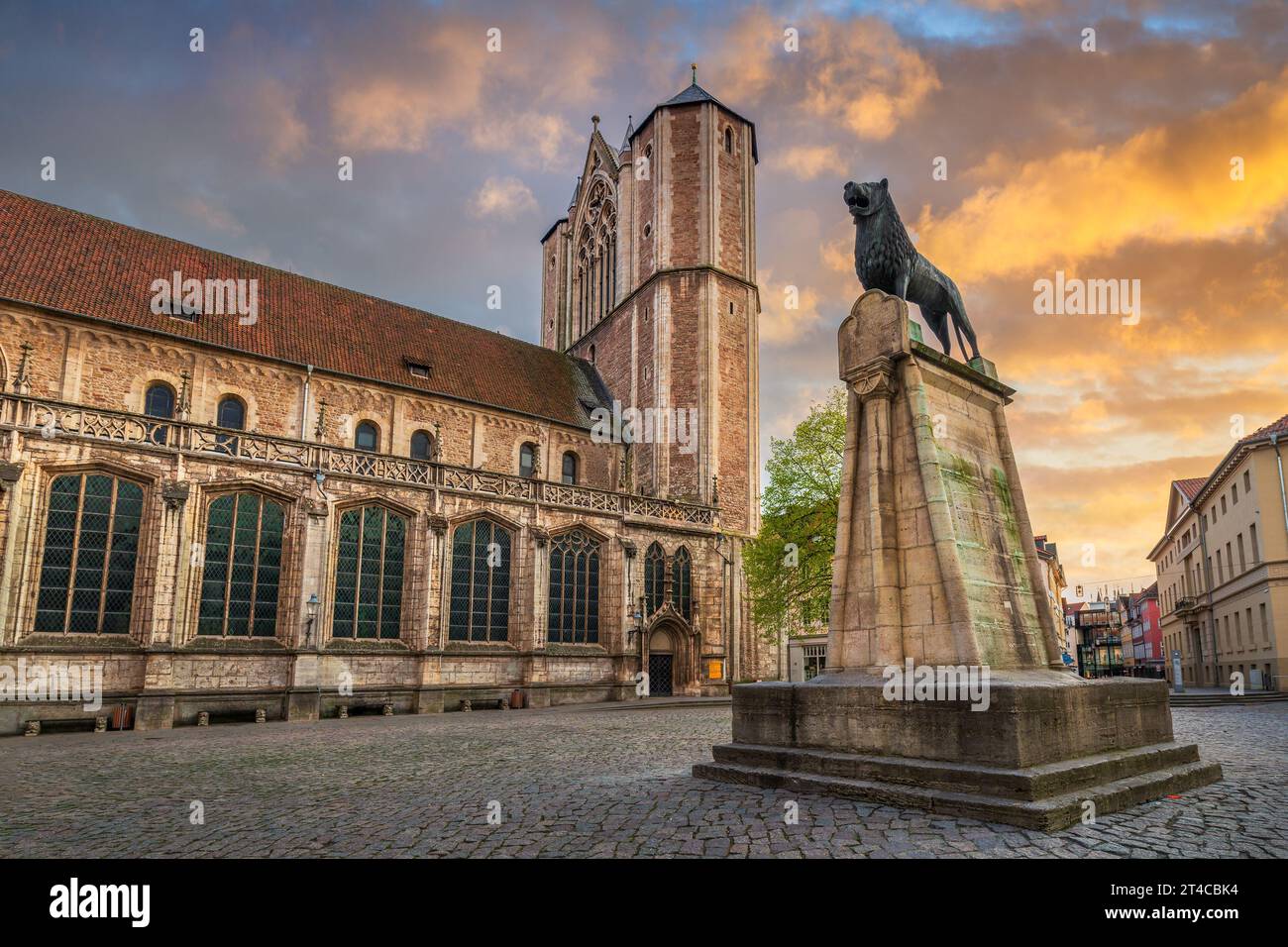 Statue of Lion and Cathedral in Braunschweig, Germany Stock Photo