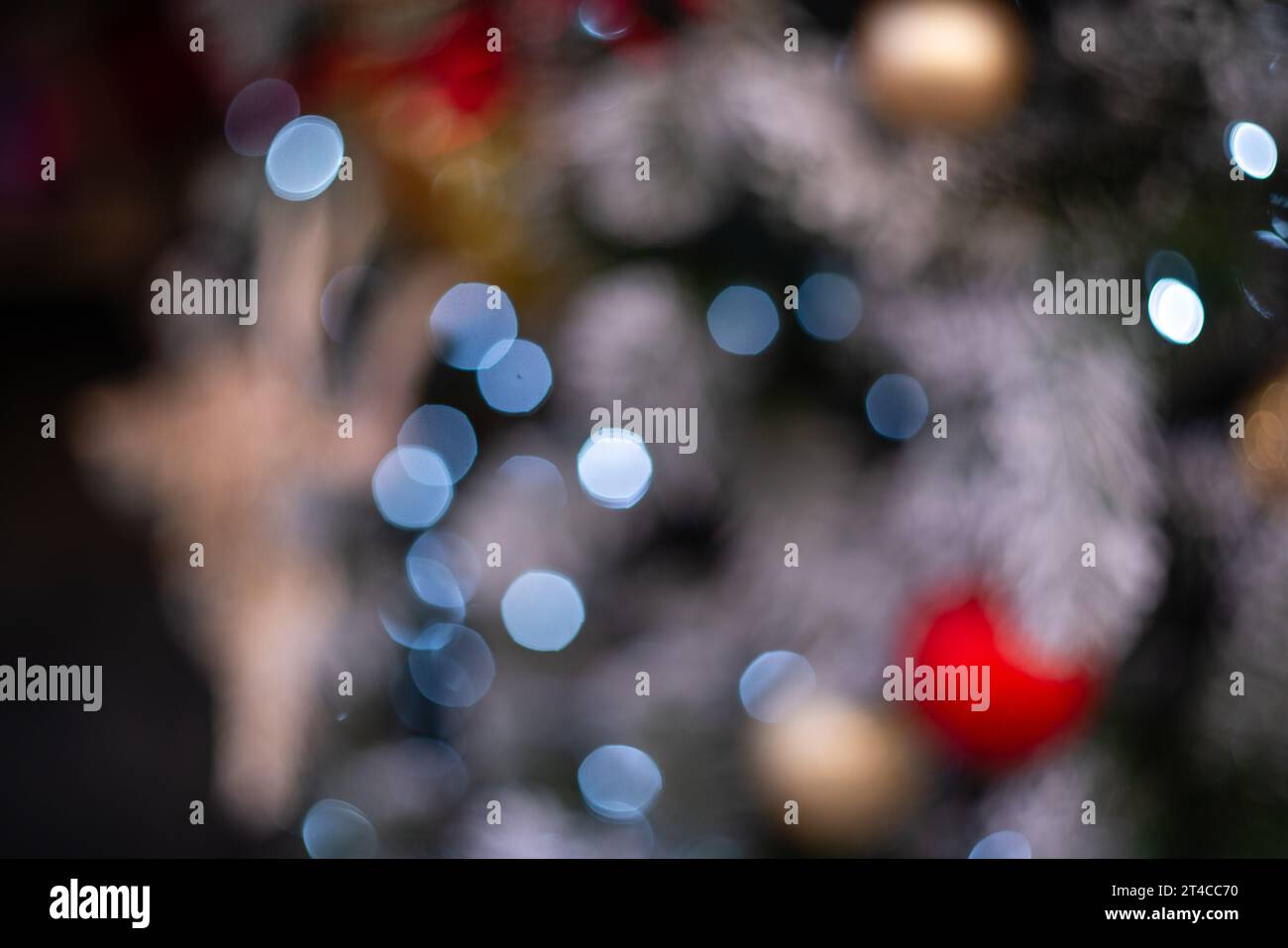 Blurred holiday background with bokeh. Defocused New Year and Christmas ...