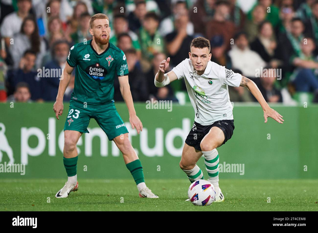 Inigo Vicente of Real Racing Club duels for the ball with Carlos Vicente of Racing Club Ferrol during the LaLiga Hypermotion match between Real Racing Stock Photo