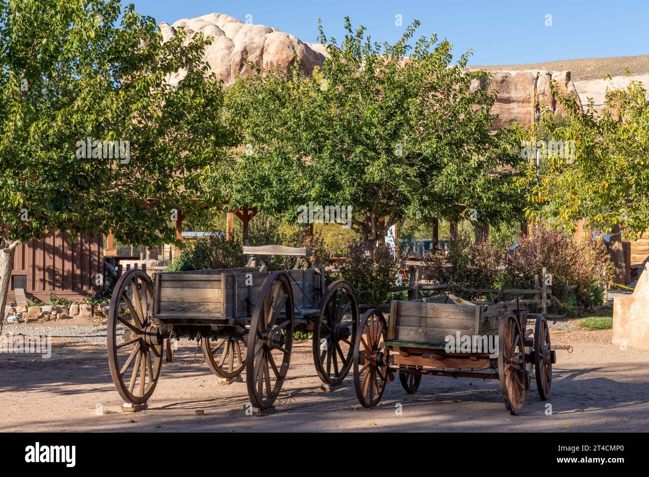 Antique vintage pioneer farm wagons at the Bluff Fort Historic Site in Bluff, Utah Stock Photo