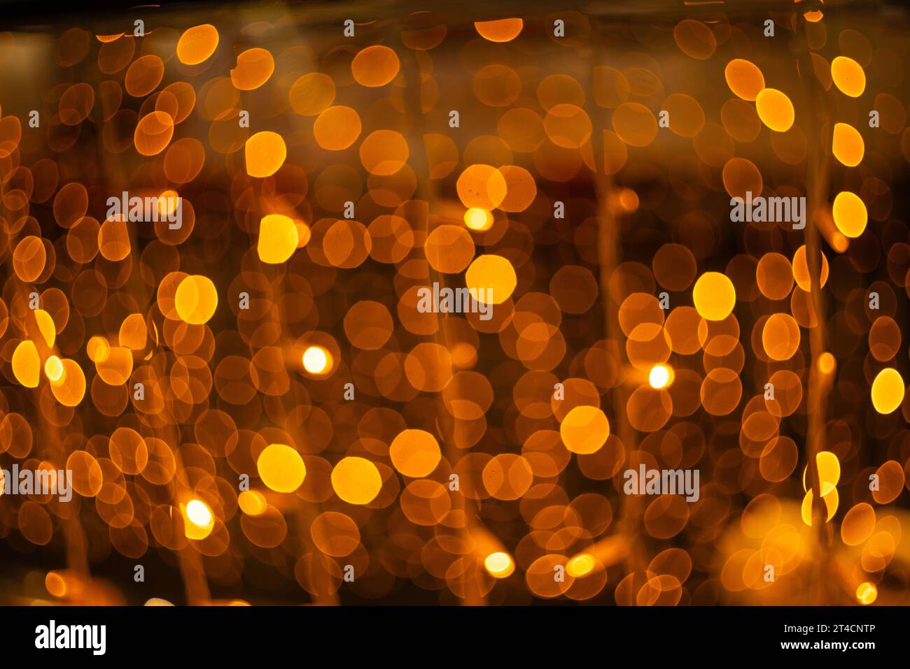 Blurred holiday background with bokeh. Defocused New Year and Christmas ...