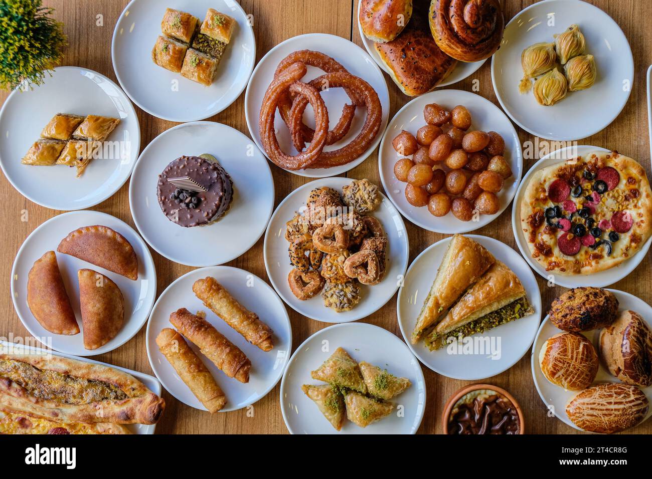A picture from above of a table with dishes of traditional Turkish sweets and pastries Stock Photo