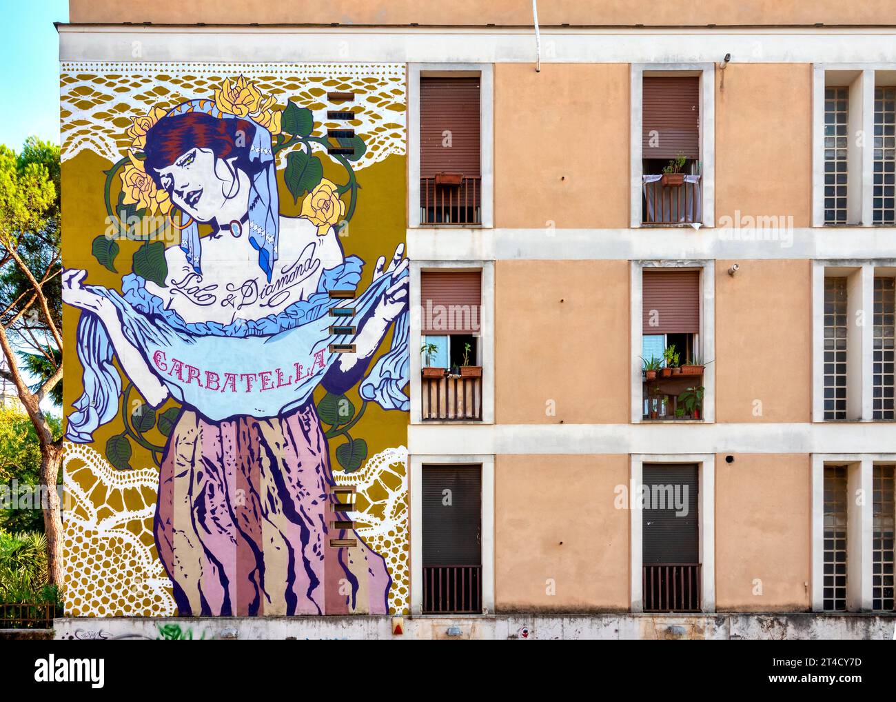 A mural by Solo and Diamond commemorating the centennial of the Garbatella founding in Via Passino, Rome, Italy Stock Photo