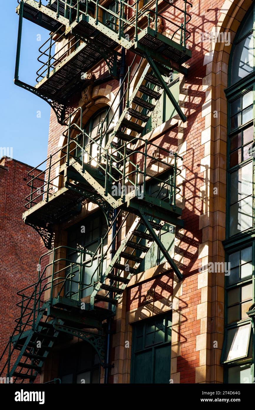 External metal fire escape on the side of a building in the Northern quarter of Manchester Stock Photo