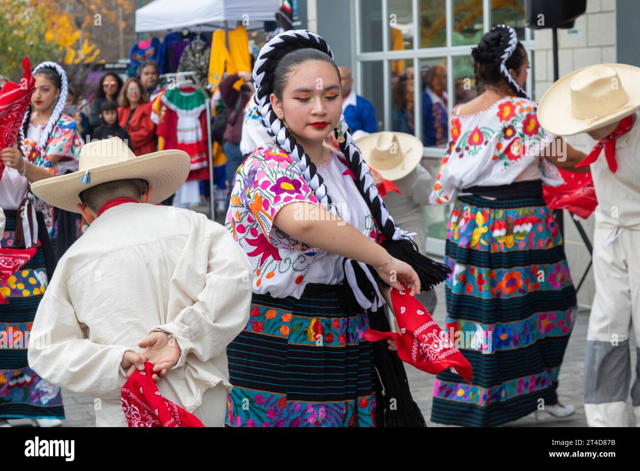 Detroit, Michigan - The Ballet Folklorico Moyocoyani Izel performs during the Day of the Dead celebration at Valade Park on the Detroit Riverfront. Stock Photo