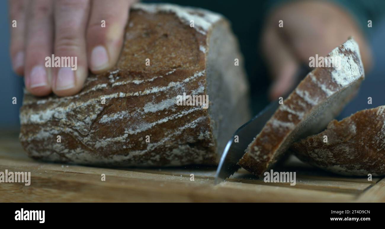 Traditional Bread Slicing with speed ramp Stock Photo - Alamy
