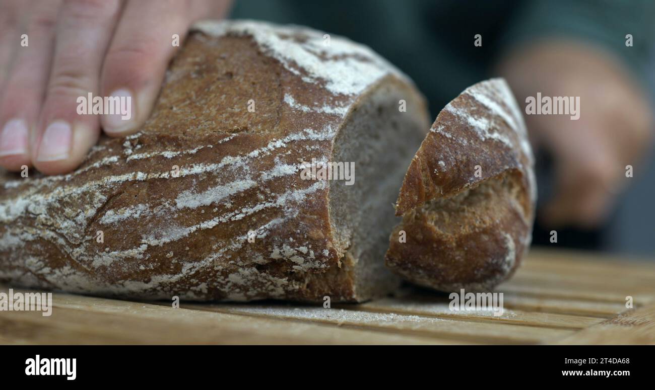 Shot of Bread Slice in speed ramp s, carb food cutting with knife Stock ...