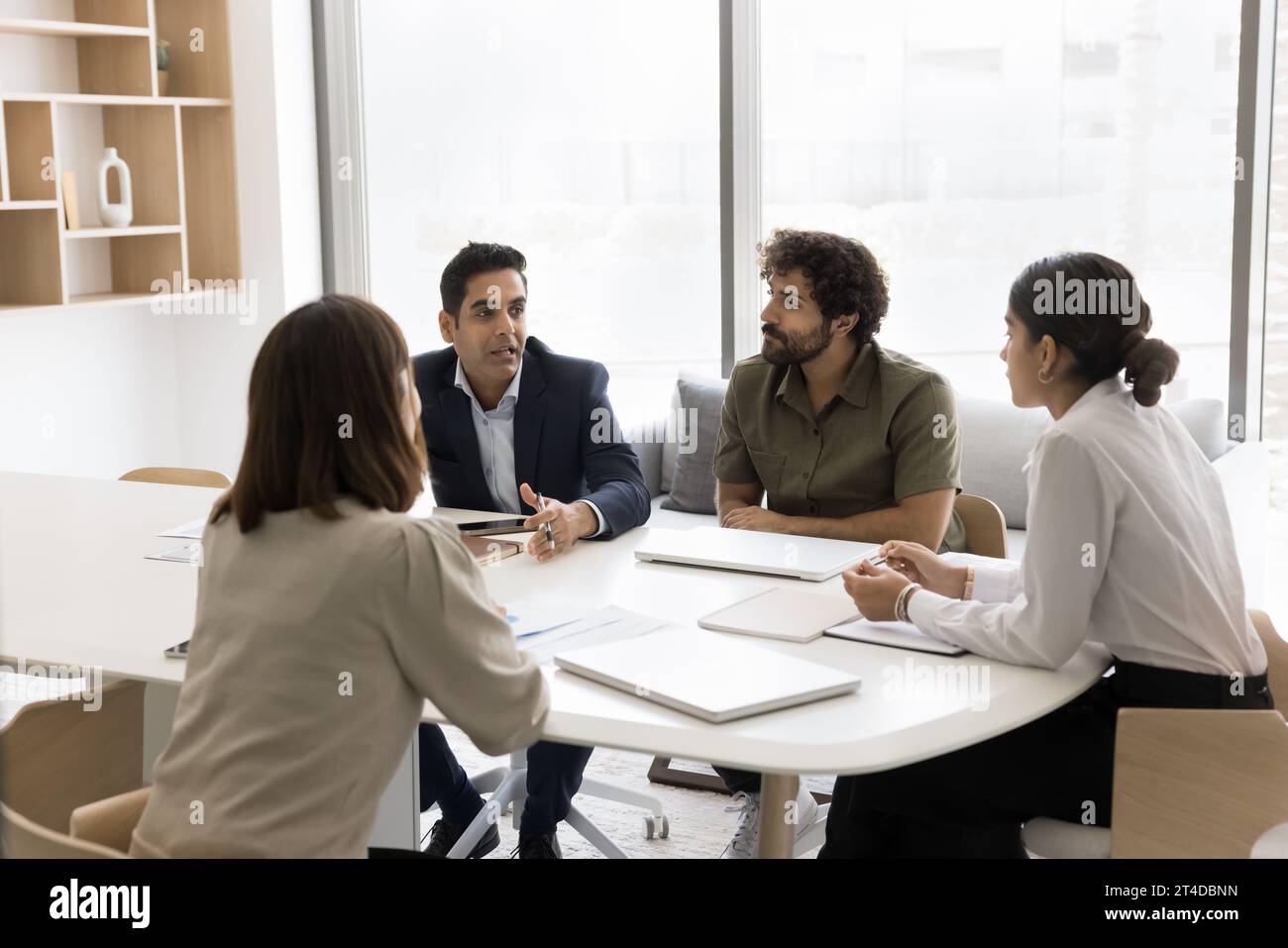 Diverse group of people meeting hi-res stock photography and images - Alamy