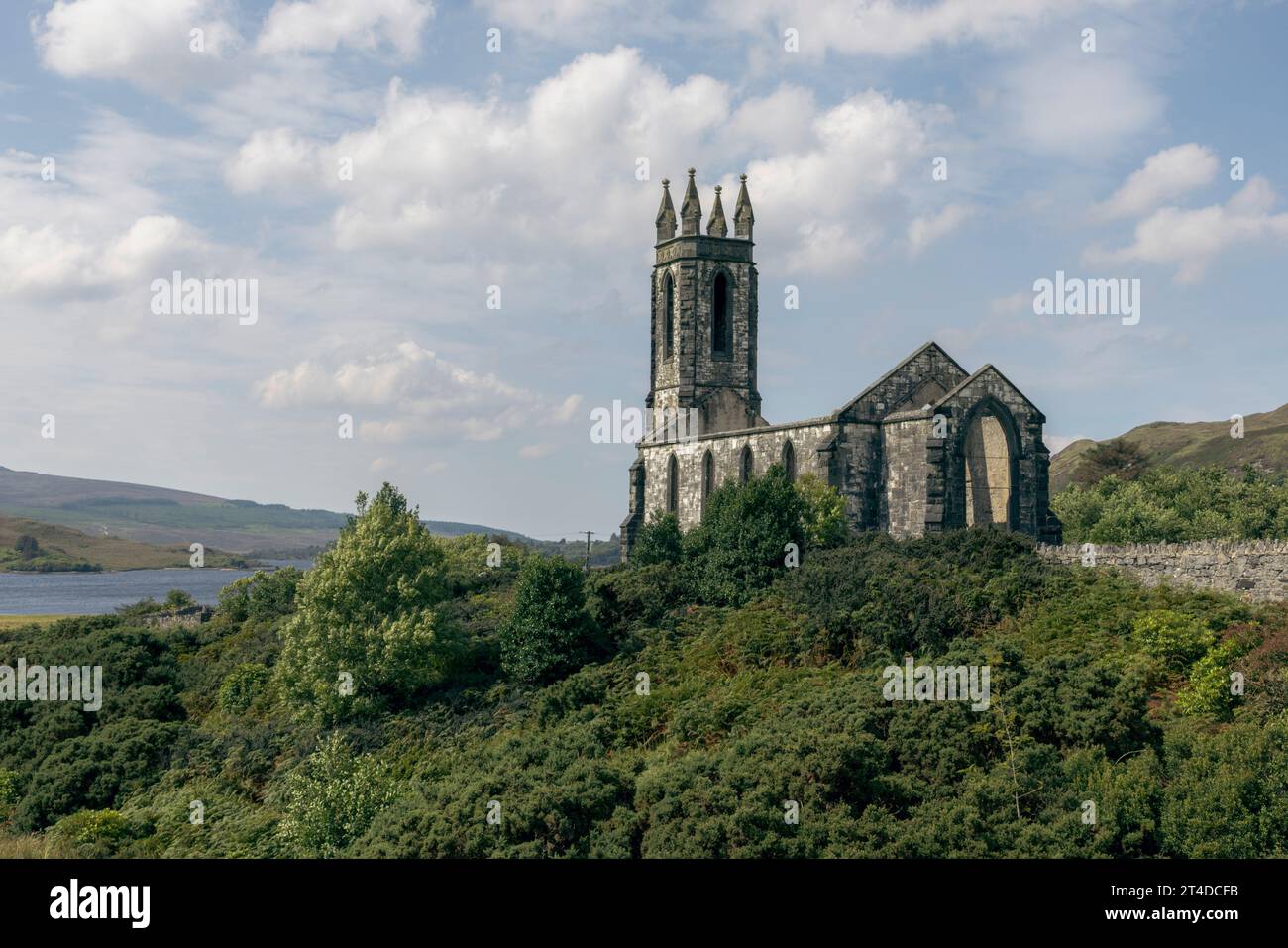 The abandoned Dunlewey Church in Ireland is a picturesque ruin with a romantic and haunting atmosphere. Stock Photo