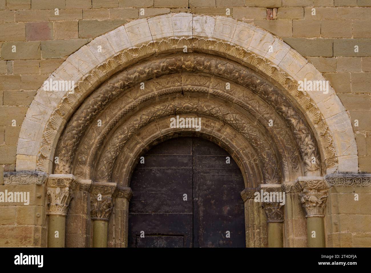Entrance doorway of the Romanesque church of Santa Eugènia de Berga (Osona, Barcelona, Catalonia, Spain) ESP: Portada de entrada Sta Eugènia de Berga Stock Photo
