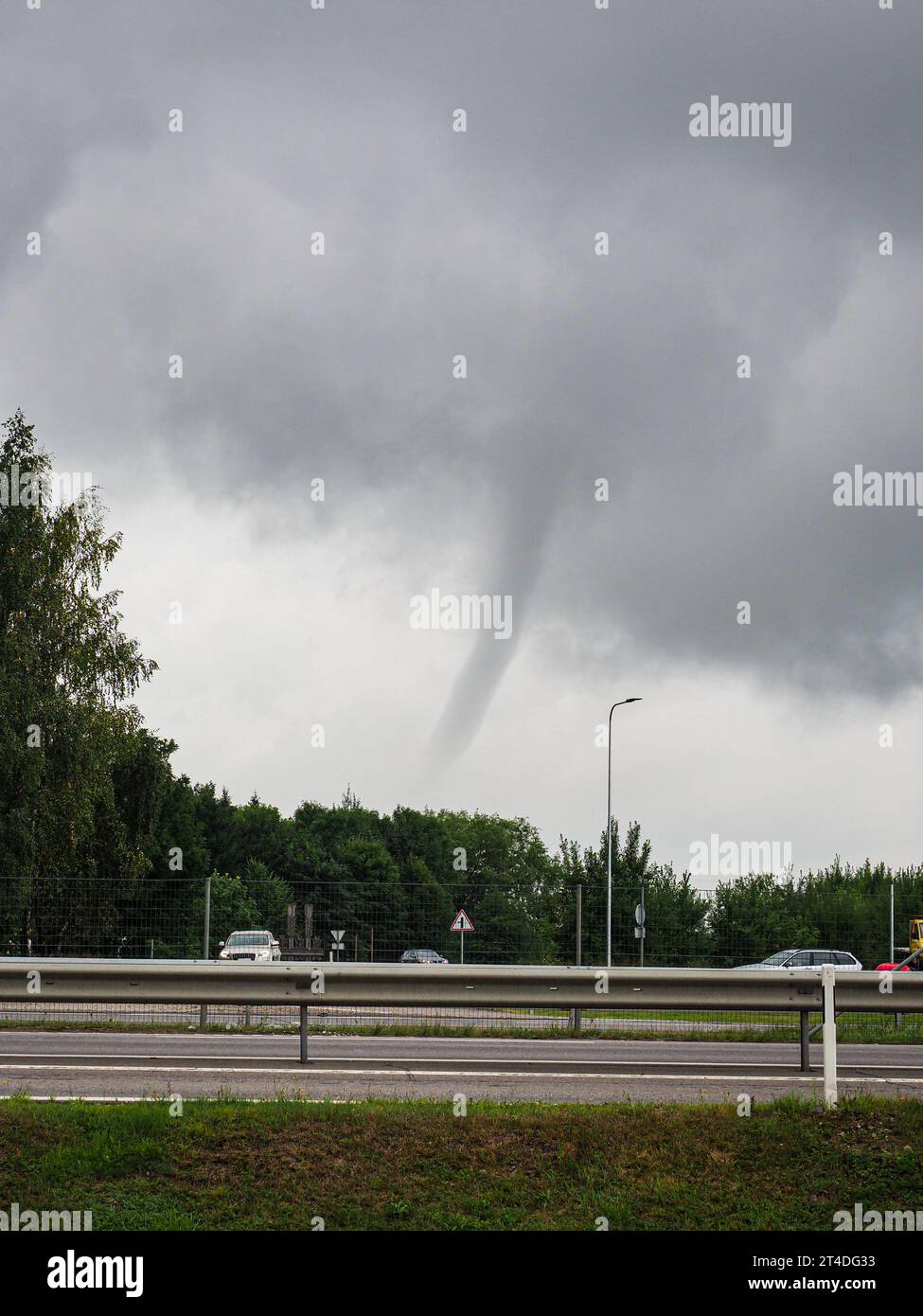 Weather Clipart-tornado swirling menacingly above a house