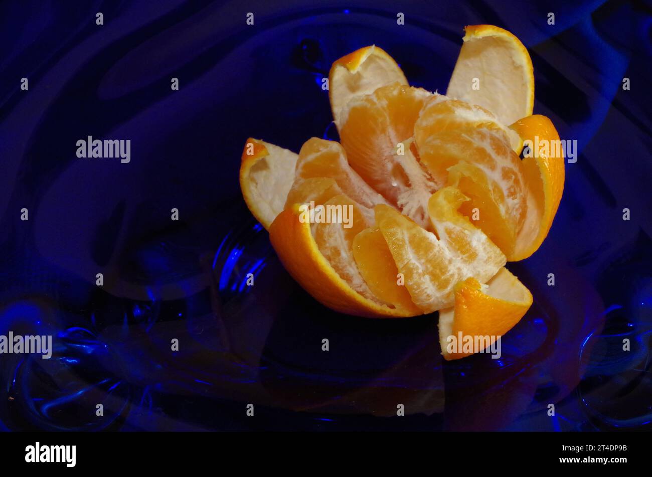 Mandarine in Glas Dish. Stock Photo