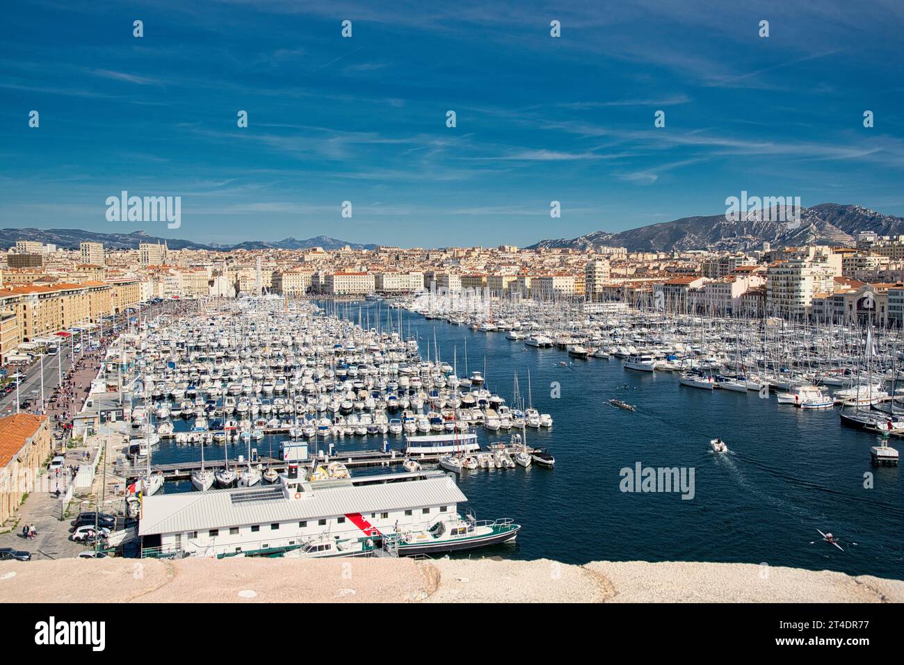 Marseille, Provence-Alpes-Côte d'Azur, France. the Old Port and notre dame de la garde from the Fort Saint-Jean. Stock Photo