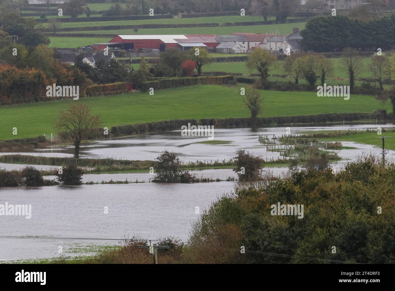 Moira, County Down, Northern Ireland, UK. 30th Oct 2023. UK weather - already over its banks the River Lagan rose higher following more heavy rain overnight. Surrounding farmland in the Lagan Valley is under substantial water for this time of year and the levels will remain high with further rain warnings in place between now and Friday as another storm-front rolls in. Credit: CAZIMB/Alay Live News. Stock Photo