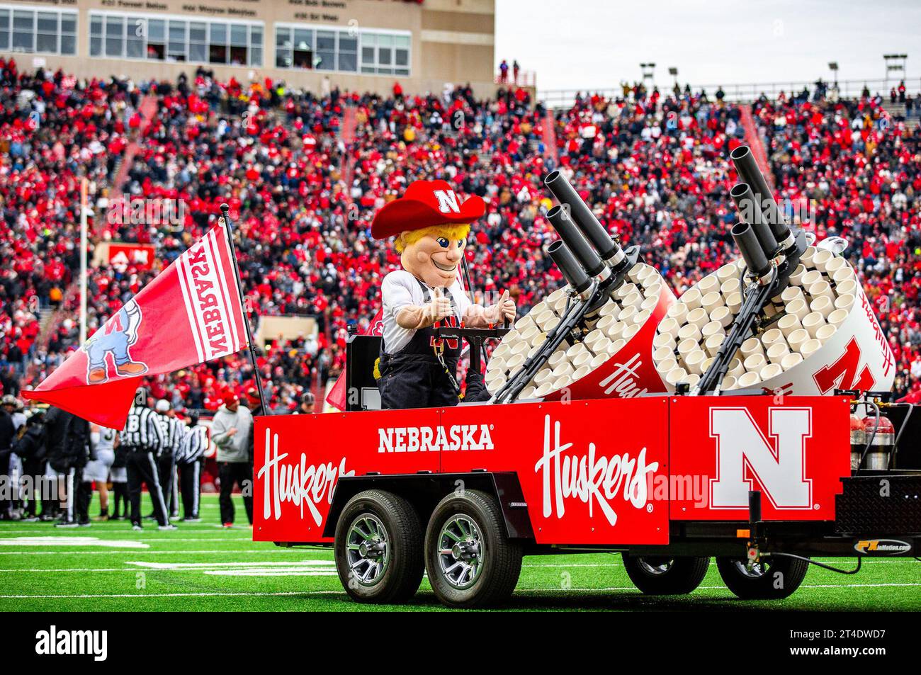 Lincoln, NE. U.S. 28th Oct, 2023. Nebraska Cornhuskers mascot, Herbie, rides around the field shooting t-shirts to the fans during a NCAA Division 1 football game between Purdue Boilermakers and the Nebraska Cornhuskers at Memorial Stadium in Lincoln, NE.Nebraska won 31-14.Attendance: 86,709.394th consecutive sellout.Michael Spomer/Cal Sport Media (Credit Image: © Michael Spomer/Cal Sport Media). Credit: csm/Alamy Live News Stock Photo